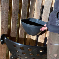 Photo of hay feeder and pellet trough