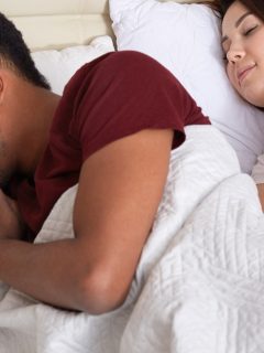 what does it mean when your husband sleeps with his back to you