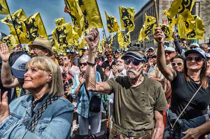 Een bijeenkomst van Vlaams Belang in Brussel. Bij de afschaffing van de opkomstplicht lijkt vooral extreemrechts stemmen te zullen verliezen. Beeld Tim Dirven