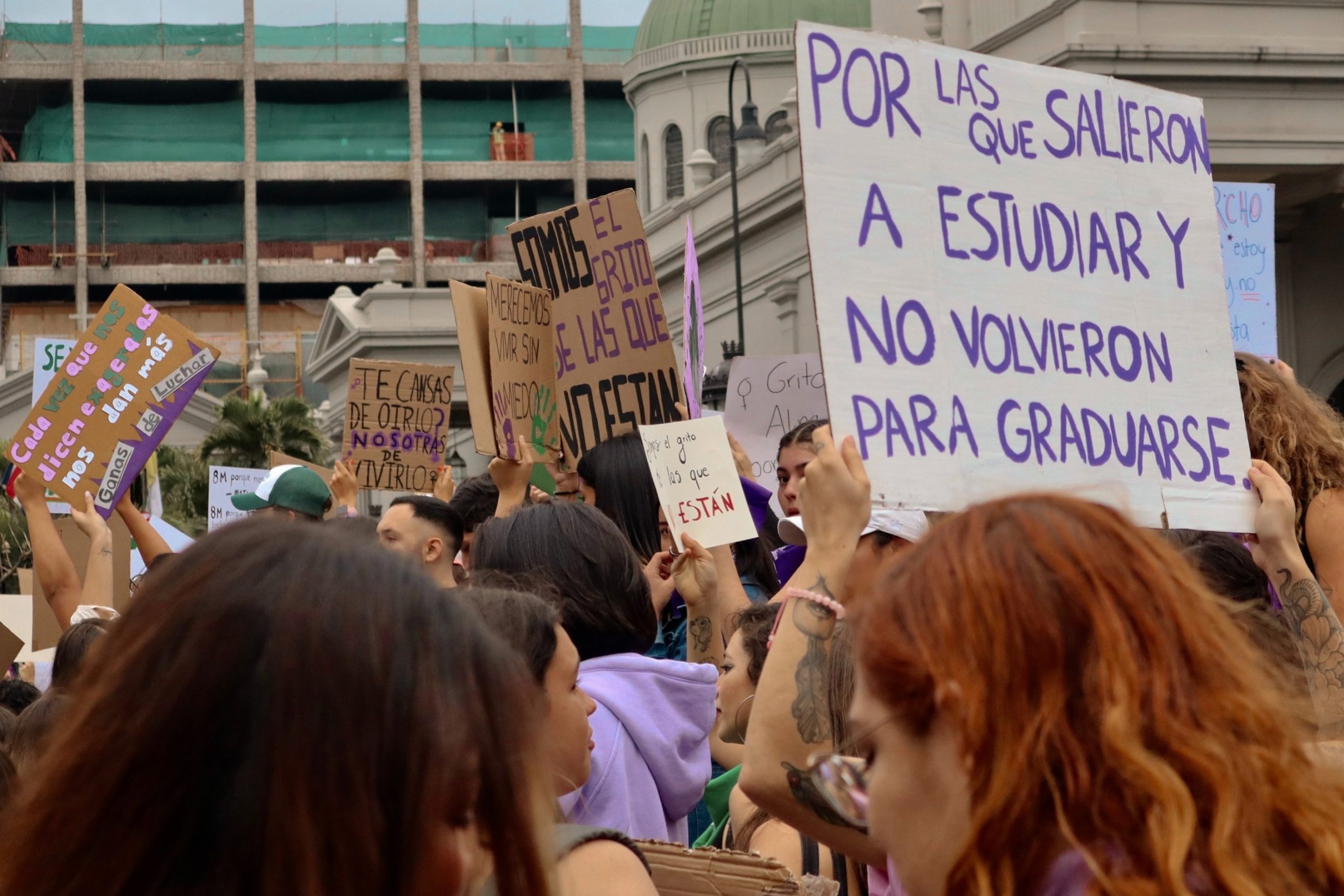 people in a crowd, protesting