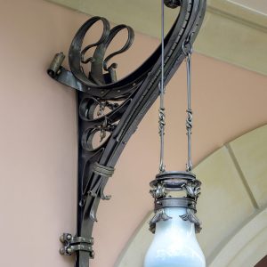 Artistic wrought iron pendant lamp with graceful curls