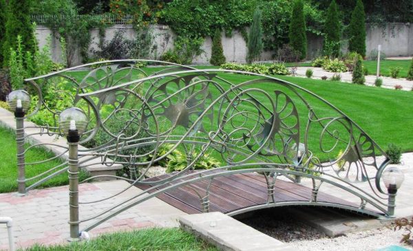 Bridge “Lily leaf” with stainless steel railing
