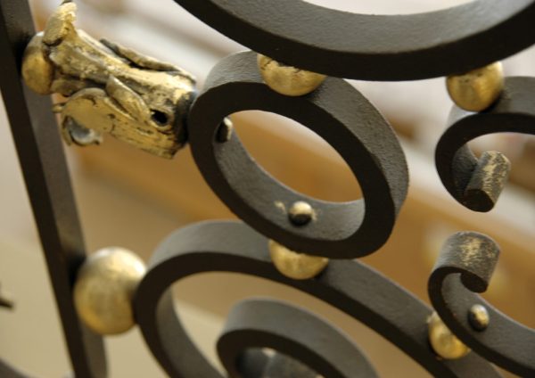 Wrought iron balustrade with gold leaf “Imperium” detail 2