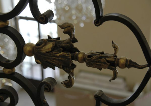Wrought iron balustrade with gold leaf “Imperium” detailed