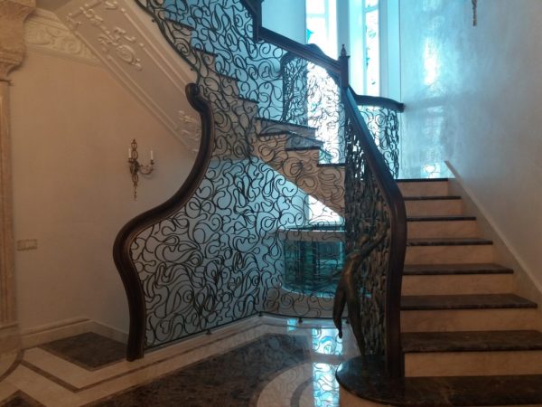 Wrought iron balustrade with wooden handrail “Spider web”
