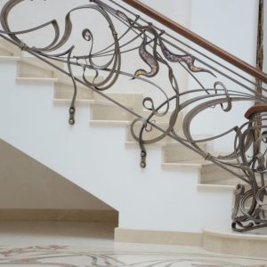 Wrought iron balustrade with wooden handrail and decorative glass “Murano”
