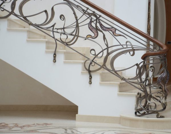 Wrought iron balustrade with wooden handrail and decorative glass “Murano”