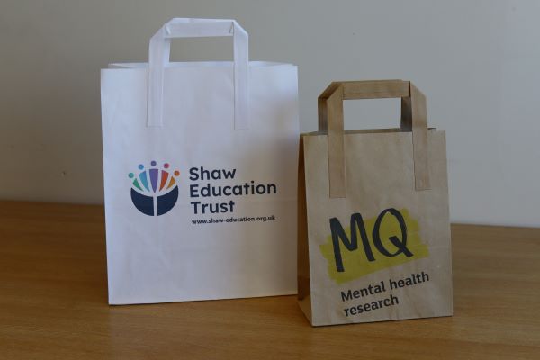 Printed paper bags, with or without handles, small runs to large runs, quick turnaround. White & Brown bags available