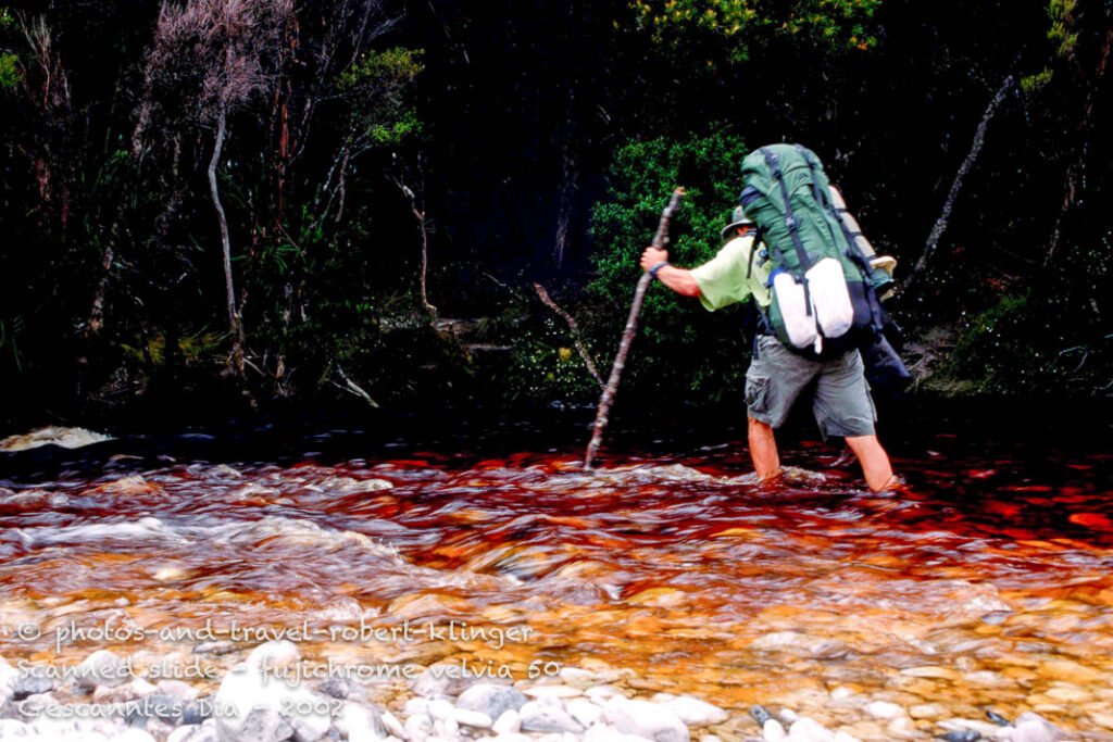 Crossing another stream on the South-West-Walk with a heavy backpack
