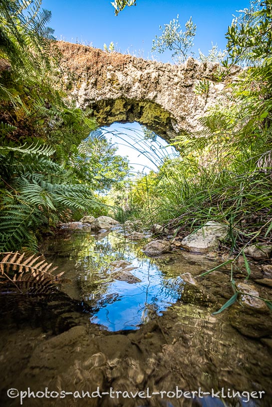 A old bridge over a stream in Albania