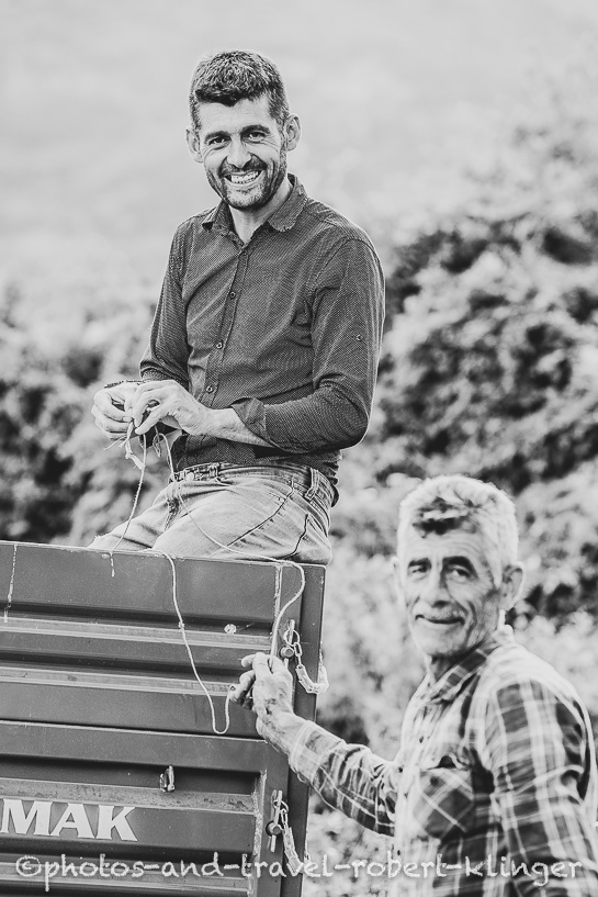 Travel portrait of two friendly farmers in Northern Macedonia