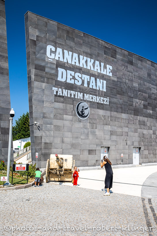 A woman taking a photo of her daughter in the Gallipoli Simulation Centre