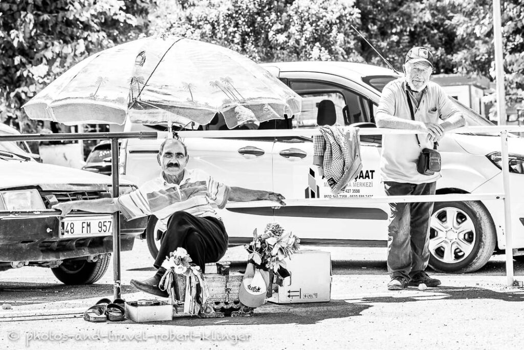 Two men on a market in Turkey, black and white photo