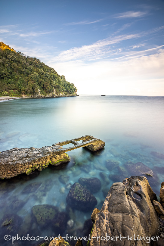 A long exposure photo of a old jetty in the black sea in Turkey