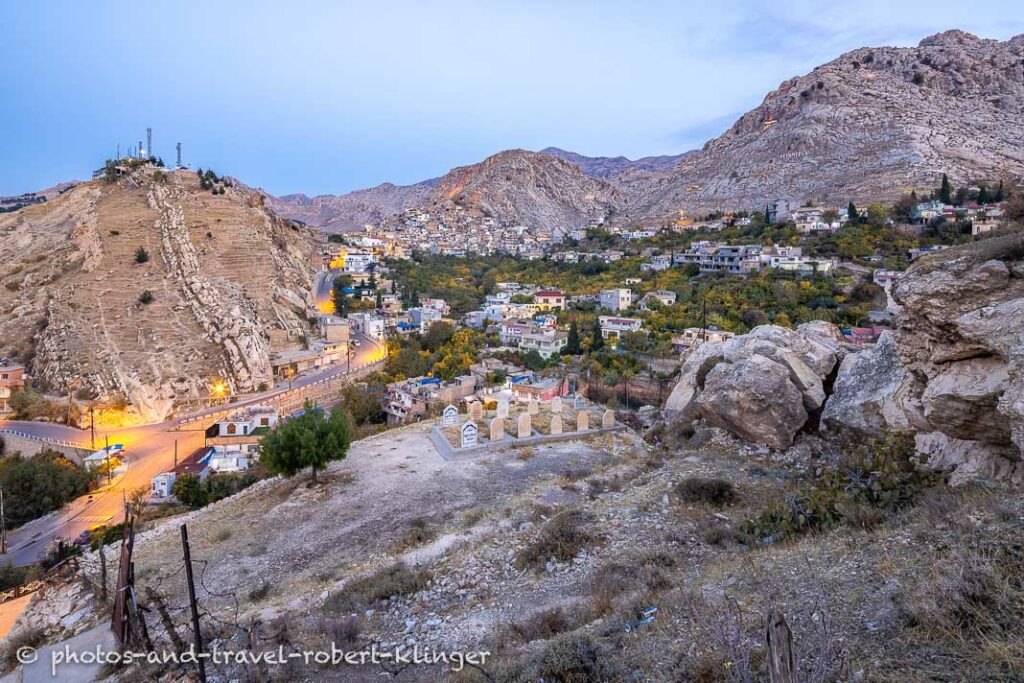 The town of Akre in the morning, a little cemetery in the foreground