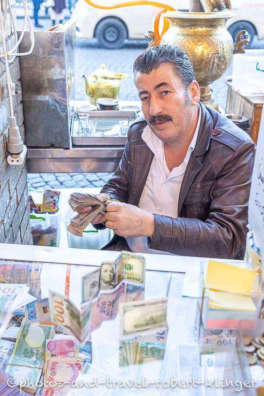 A money changer in Erbil,