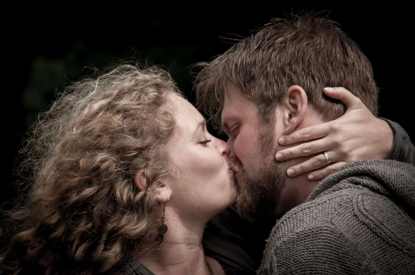 Matt & Rachel sneak a smooch during an "Save the Day" photoshoot in Bruges Belgium. Photo by Photo Tour Brugge.