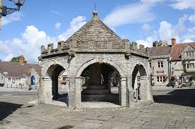 The Buttercross a stone structure with a cross on top