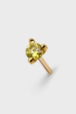 FROM ABOVE VIEW OF PLANCTOLOGY® DRIFTER 2. TINY 14K SOLID GOLD STUD EARRING WITH YELLOW ROUND CUT STONE.