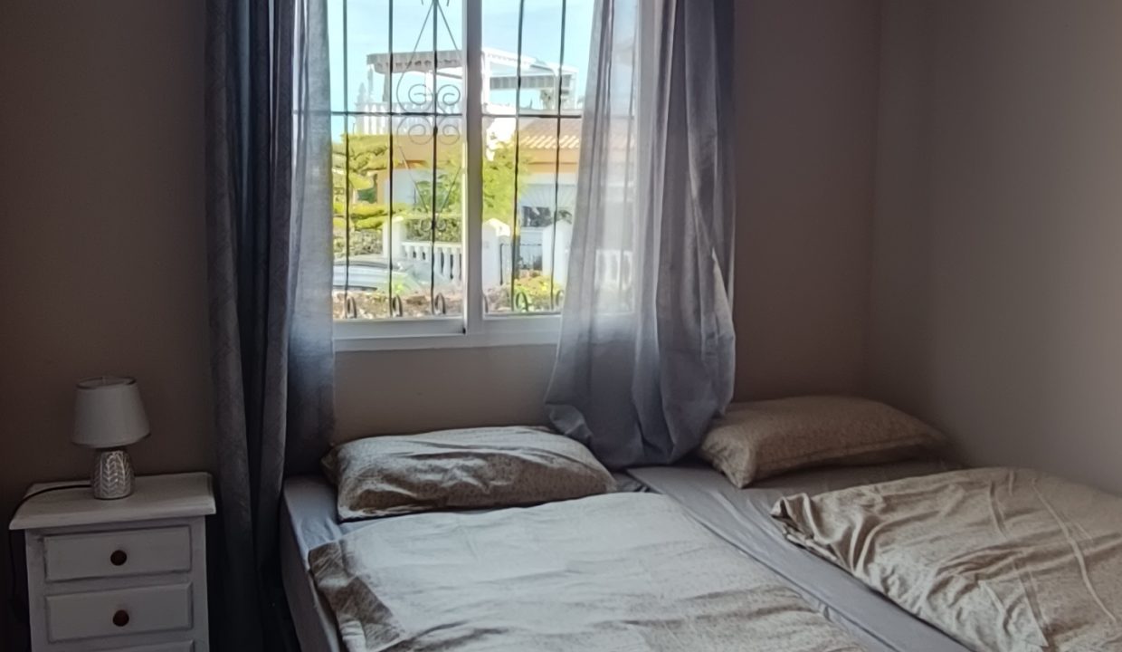 Bedroom With Ceiling Fan And Window - PM Torrevieja