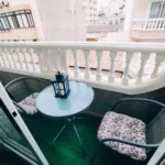 El Moncayo Properties offers this wonderful apartment for sale in the center of Guardamar del Segura.. . - CHARACTERISTICS -. . The house has 143m2 of housing according to cadastre distributed in:. . - Three bedrooms; a first master bedroom with an exterior window facing west