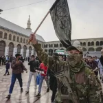 Medya Erebî bo êrîşa Siwêdayê: Gelo deshilata Sûriyê tenê komeke cîhadî ye?