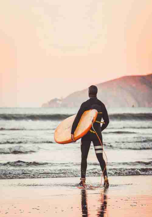 Surfare i Karibien i soluppgång Poster