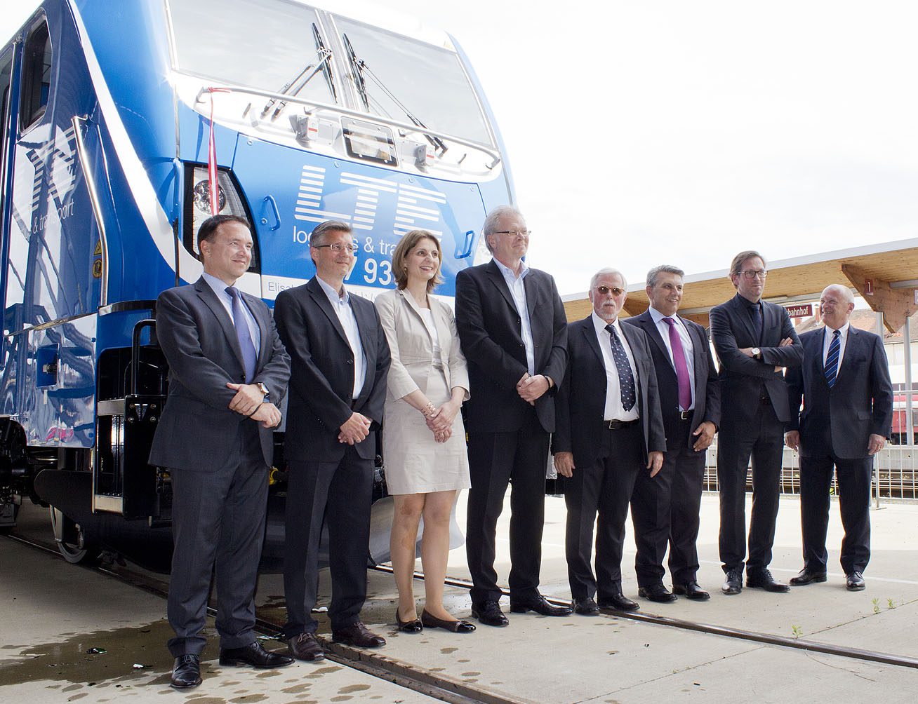 From left Michael Baier (CEO LTE), Michael Benda (CFO LTE), Mag. Elisabeth Landrichter (godmother of the locomotive), Andreas Mandl (CEO LTE), Dr. Karl Johann Hartig (Bombardier Transportation), Mag. Franz Weintögl (general manager GKB), Guy Degrave (Bombardier Transportation), Hubert Mierka (Danubian port Krems). - Copyright Barus