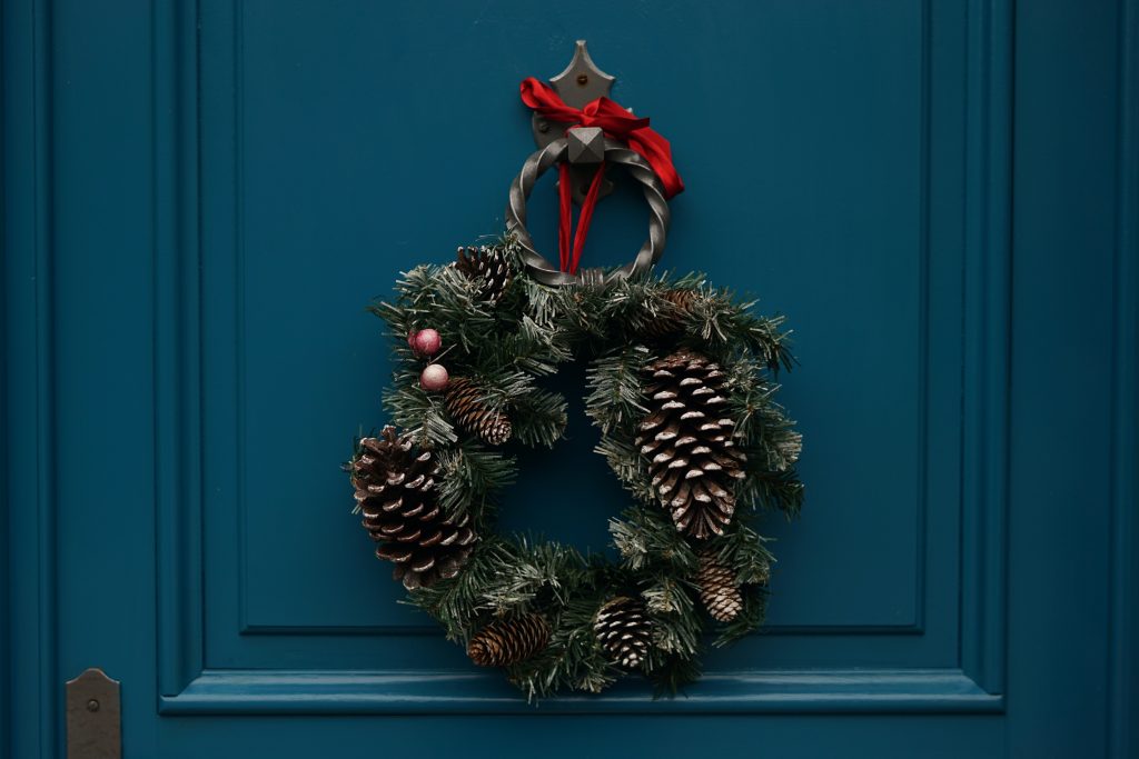 Chrismas wreath on a blue door.