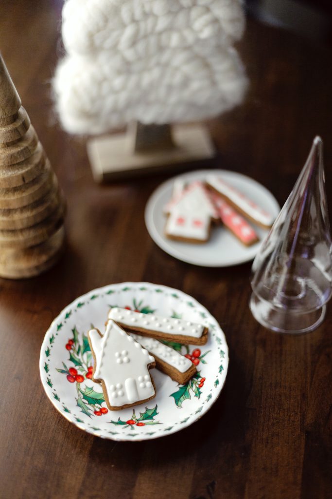 Frosted christmas cookies shaped like a house