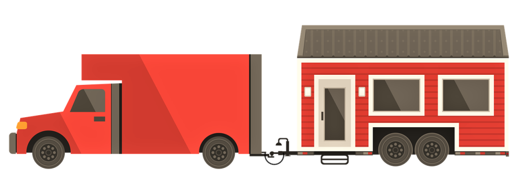 Red truck pulling red Tiny House cartoon