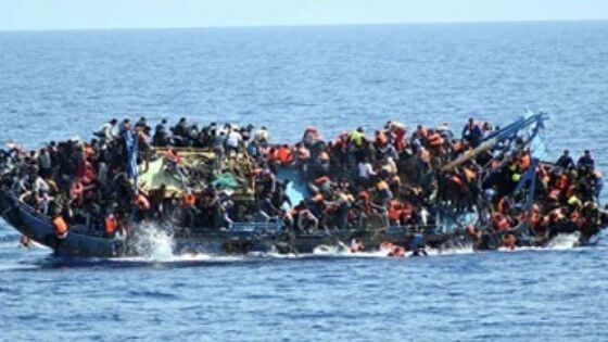 Overcrowded boat with refugees capsizes