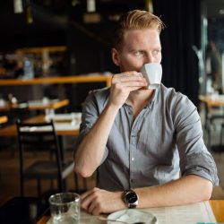 businessman-drinking-coffee-95EGCB9