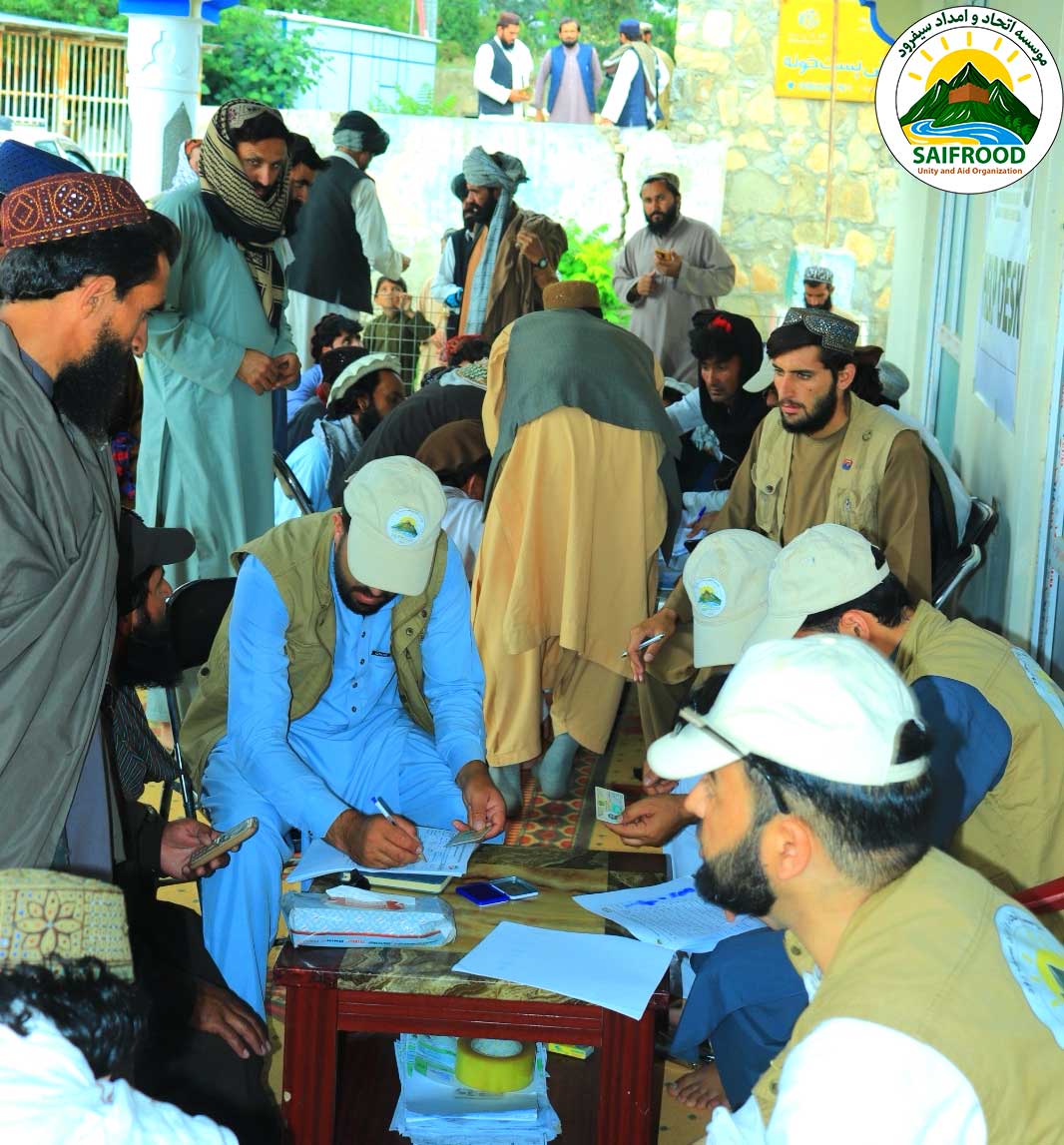 Humanitarian coordination meeting between project staff and community representatives in Khost Province.