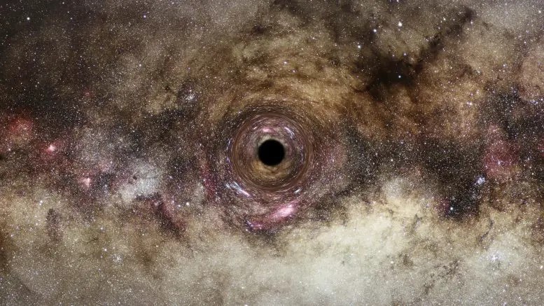 L'impressione di un artista di un buco nero, dove l'intenso campo gravitazionale del buco nero distorce lo spazio circostante. Questo deforma le immagini della luce di sfondo, allineate quasi direttamente dietro di essa, in distinti anelli circolari. Questo effetto di "lensing" gravitazionale offre un metodo di osservazione per dedurre la presenza di buchi neri e misurare la loro massa, in base a quanto è significativa la flessione della luce. Il telescopio spaziale Hubble prende di mira galassie lontane la cui luce passa molto vicino ai centri delle galassie in primo piano, che dovrebbero ospitare buchi neri supermassicci oltre un miliardo di volte la massa del sole. Crediti: ESA/Hubble, Digitized Sky Survey, Nick Risinger (skysurvey.org), N. Bartmann
