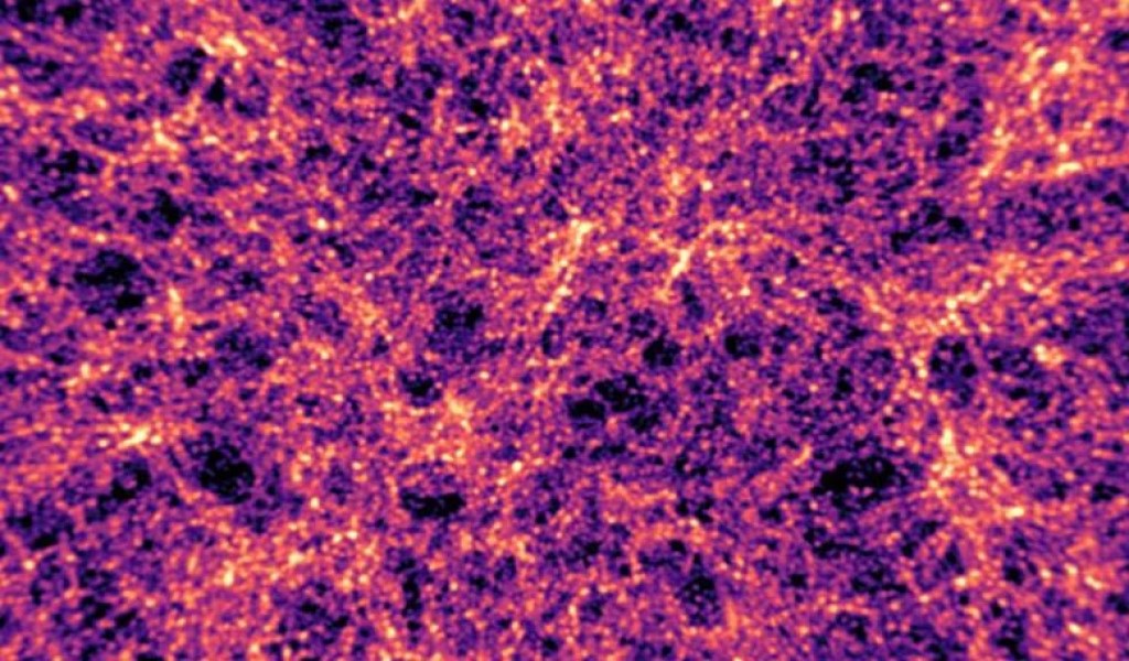 Una mappa della materia derivata da uno degli universi simulati. Le aree più chiare della mappa mostrano le regioni in cui la materia oscura è più densa. Questi corrispondono ai superammassi di galassie. Le macchie scure, quasi nere, sono vuoti cosmici, i grandi spazi vuoti tra gli ammassi di galassie. Credito: Niall Jeffrey et al
