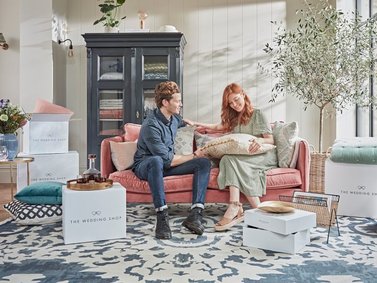 married couple enjoyes wedding presents delivery The Wedding Shop hero 1 768x576