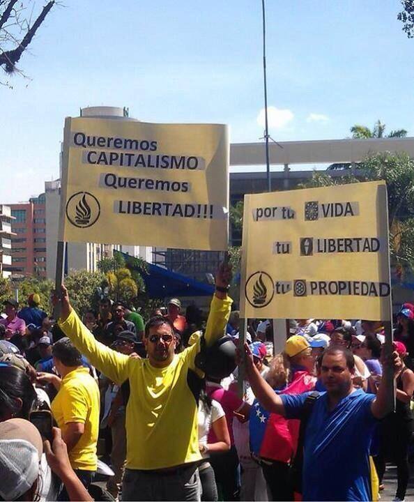 Translation We want capitalism We want liberty - for you life your liberty and your property