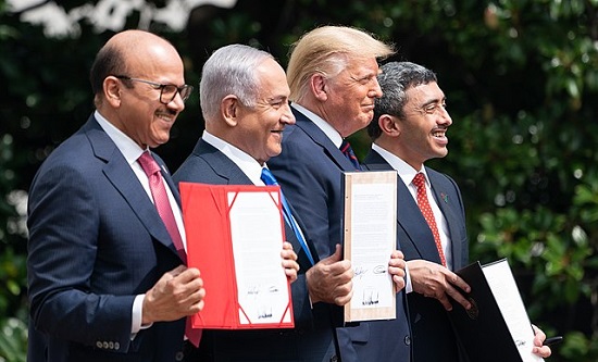 President Donald J. Trump, Minister of Foreign Affairs of Bahrain Dr. Abdullatif bin Rashid Al-Zayani, Israeli Prime Minister Benjamin Netanyahu and Minister of Foreign Affairs for the United Arab Emirates Abdullah bin Zayed Al Nahyanisigns sign the Abraham Accords Tuesday, Sept. 15, 2020, on the South Lawn of the White House. (Official White House Photo by Joyce N. Boghosian)