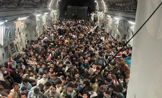 Military plane carrying passengers out of Afghanistan
