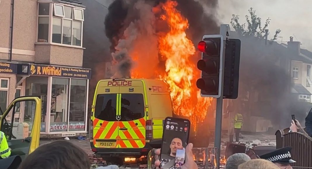 Van on fire during the 30 July 2024 Southport Riots