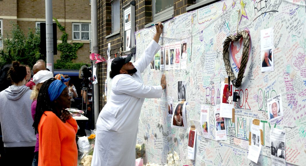 Wall of tributes to the casualties of the Grenfell Tower fire in Bramley Road, London