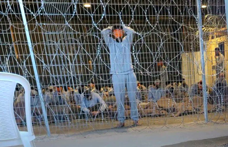 A leaked photo of Palestinian prisoners held in a detention facility at the Sde Teiman military base