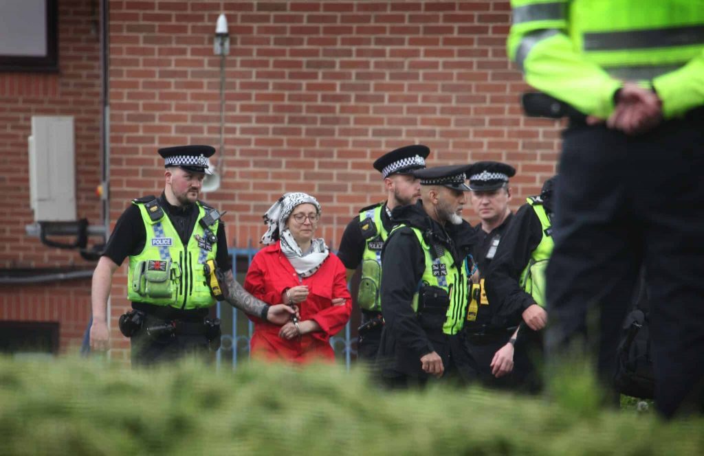 Francesca Nadin is arrested after an action at the Teledyne Defence & Space in Shipley, Bradford, in May