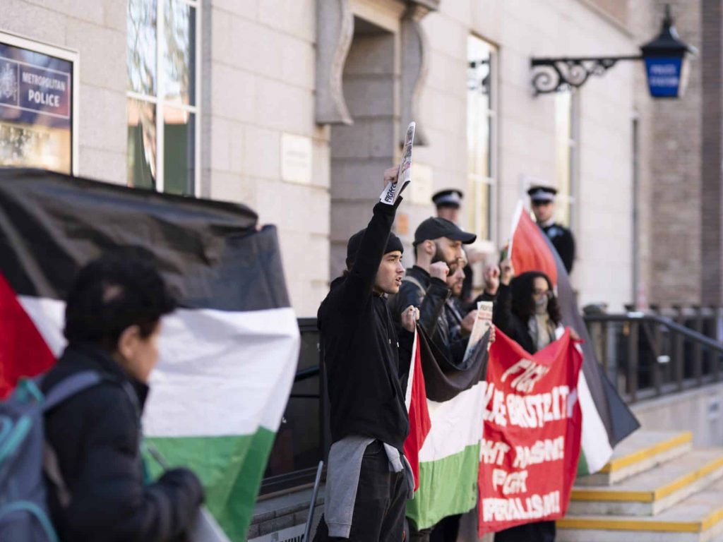 Supporters of FRFI protest outside Hammersmith Police Station holding banner reading 'Fight Police brutality, fight racism, fight imperialism' (photo: supplied)