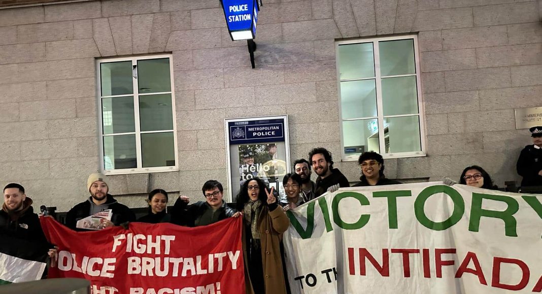 Supporters of FRFI protest outside Hammersmith Police Station holding banners reading 'Fight Police brutality, fight racism, fight imperialism' and 'victory to the intifada' (photo: FRFI)