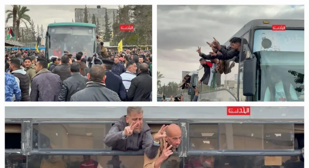 Palestinian prisoners returned to their communities wave from coach windows as crowds look on