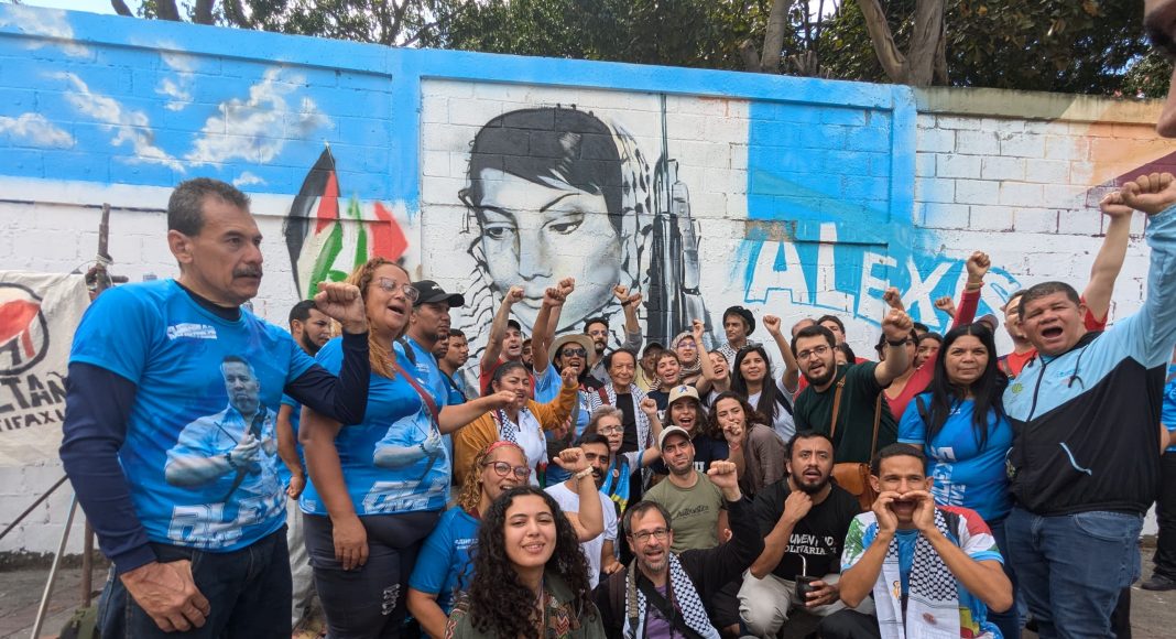 Leila Khaled, the symbol of Palestinian resistance, visited El Panal Commune to find the iconic image of her holding an assault rifle turned mural.