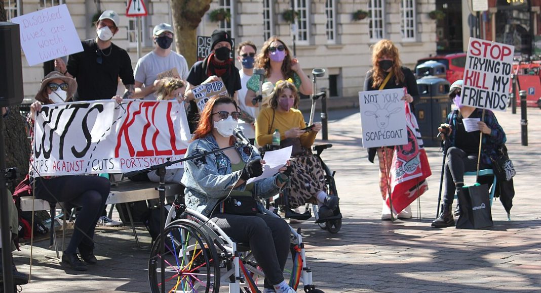 Protest against disability benefit cuts by Crips Against Cuts, April 2025 (photo: Tim Sheerman-Chase/Flickr)
