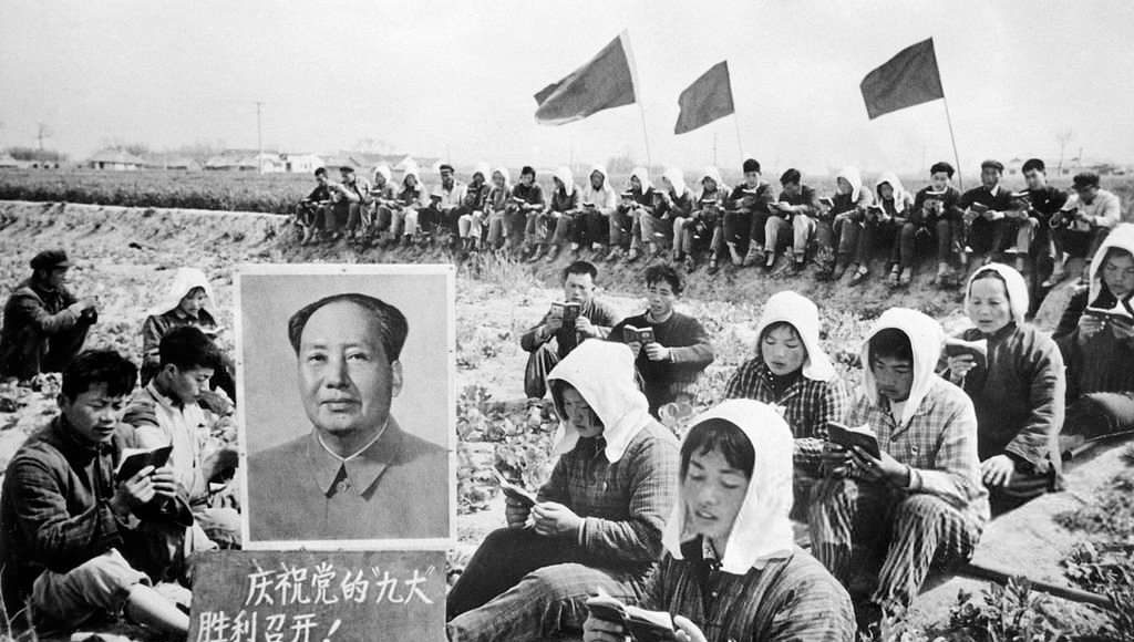 Agricultural workers read Mao's 'little red book', 1969